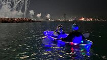 Night kayaking in Dubai with Burj Khalifa views