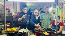 Saigon Food Tour by Scooter with Eleven Tastings
