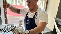 Traditional Cooking Class of Sardines with Dish Auction in Madrid