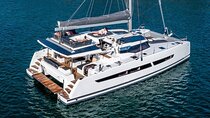Mykonos: Brand-New Catamaran Cruise with Meal, Drinks & Transport
