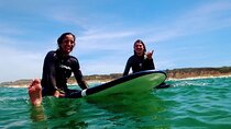 Private tour in the south bank of tagus with a Surf experience