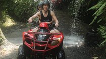 ATV Quad Bike Through Tunnel and Waterfall