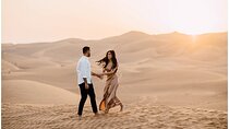 Private Sunrise Desert Safari with Camel Ride and Sand Boarding 