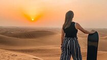 Private Morning Red Dune Safari with Camel Ride & Sandboarding