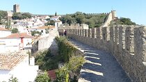 From Lisbon: Medieval Obidos, Nazare & Peniche Waves Private Day