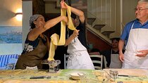Traditional pasta rolling in an ancient Tuscan home