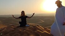 Private Dubai Sunrise with Red Dune Bashing camel ride boarding