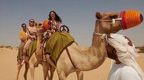 Red Dune Desert Safari Dubai Camel Ride Sandboarding & BBQ Dinner