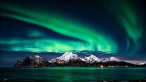 Northern Lights with hot chocolate, donuts and icelandic beer