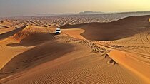 Premium Camp Red Dune Desert Safari Camel Ride and Sandboarding