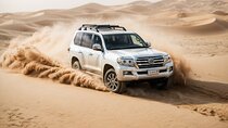 Dubai Desert Safari with Quad Bike, Sand Boarding & BBQ Dinner