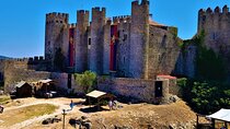 Tranquility to Thrills: Obidos,Alcobaca and Nazare Private Tour 