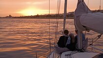 Sunset sailing boat trip in Lisbon with snacks