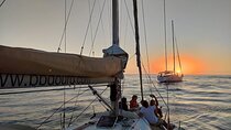 Sightseeing Sunset Sailboat Tour along Tagus River