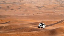 Dubai Desert Safari with Quad Bike, Camel Ride, Dinner and Shows