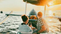 Sunset Cruise to Uluwatu Cliffside Golden Horizon