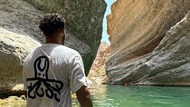 From Muscat Wadi Shab and Bimmah Sinkhole Tour
