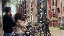Explore Amsterdam by Bike in the Company of a French Local Guide