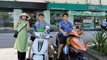 Saigon Morning City Historical Scooter Tour w Ao Dai Rider option