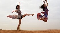 Red Dunes Desert Safari with BBQ Dinner, Camel Riding & Live Show