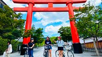 Pedal Adventure Kyoto's iconic landmarks on an e-bike tour