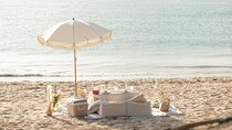 Romantic Picnic on a Phuket Beach During Sunset