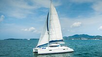 Phuket Catamaran Tour to Coral Island and Sunset Voyage 