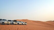 Red Dunes Safari Dubai Tour with Camel Ride, BBQ and Live Shows 