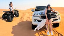 Desert Safari Dubai Tour with Dune Bashing, Camel Ride, & BBQ
