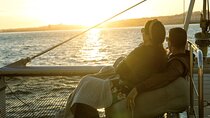 Sunset Experience: Lisbon Boat Cruise with Music and a Drink