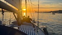 Sunset sailboat tour in Lisbon with green wine