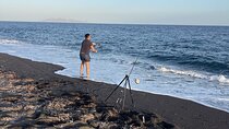 Santorini Fishing on a Peaceful Volcanic Beach