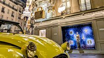The magical illuminations of Christmas in Paris in an antique car!