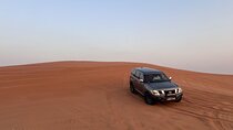 Evening Desert Safari, Camel Ride, Sand Boarding & BBQ Dinner 