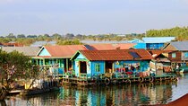 Premium Sunset Floating Village Tour with 4-course Khmer Dinner