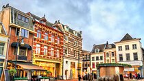 Private transfer: Amsterdam to Arnhem with 2h Sightseeing stop