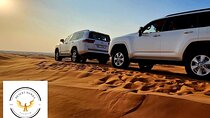 Desert Safari Adventures: Dune Bashing, Camel Rides, and BBQ,