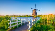 Private transfer: Amsterdam to Kinderdijk, 2h sightseeing stop
