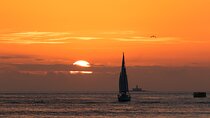 Sailing boat experience at sunset in the Tejo River