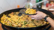 Cook your Paella with Purchase to Russafa Market in Valencia