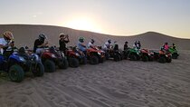 Quad in Dunes and Beach
