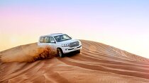 Sunset Red Dunes Safari with BBQ Feast and Arabian Entertainment