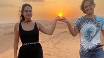 Dubai Desert Safari with Camel Ride and Sandboard