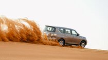 Premium Red Dunes Desert Safari with Camel Ride and BBQ Dinner