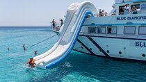 Blue Lagoon cruise: giant slide, music & Paphos hotel transfers