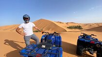 1 Hour Merzouga Dunes Quad Biking Excursion & Sandboard activity