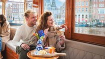 Amsterdam: Romantic Canal Cruise with Unlimited Bubbles & Bites