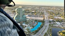Sunset Helicopter Tour around Hard Rock Guitar, Cities & Beaches