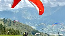 Paragliding Over Medellín + Gopro & Photos + Private transport.