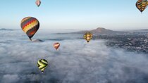 Hot Air Balloon Flight with Breakfast in Cave and Transportation